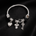 Charm Bracelet Stainless Steel with Heart Star Charms by Aureo - Aureo Corner 